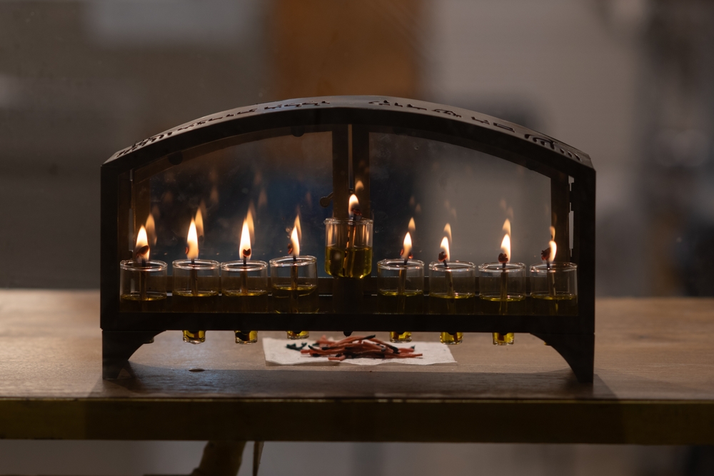 Preparing and lighting the menorah