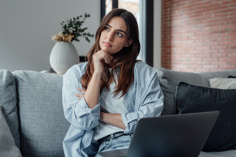 working woman taking time to think